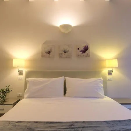 아파트 Imola Suites